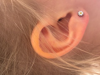 Children's piercing by Emerald & Opal